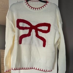 Women's Cream Sweater with Red Bow Design